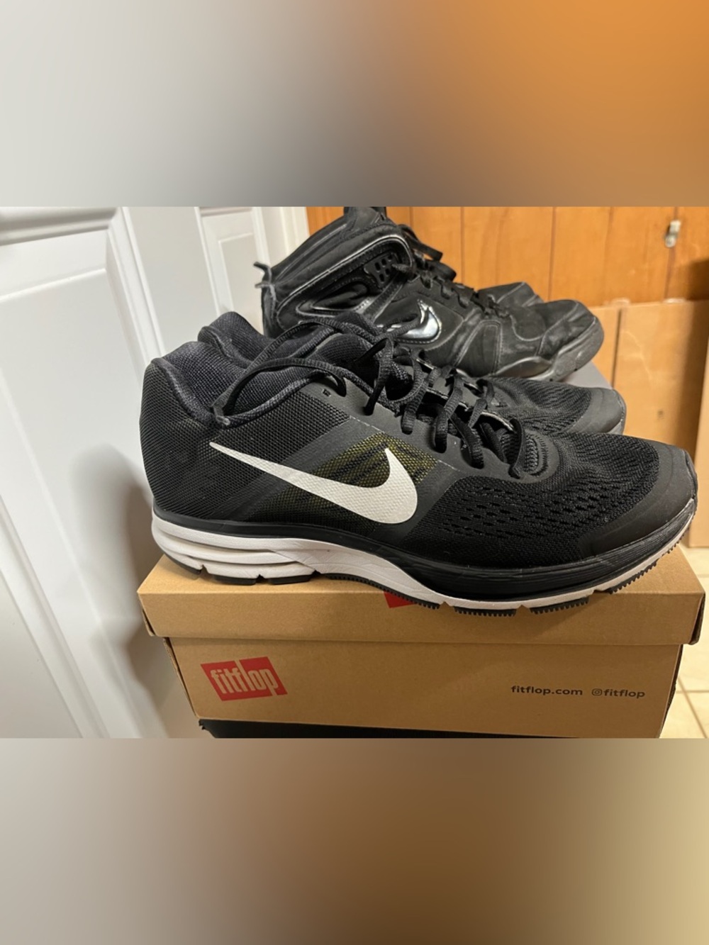2 pairs of Nike Black Shoes with Blue Trim and Neon Green Insole